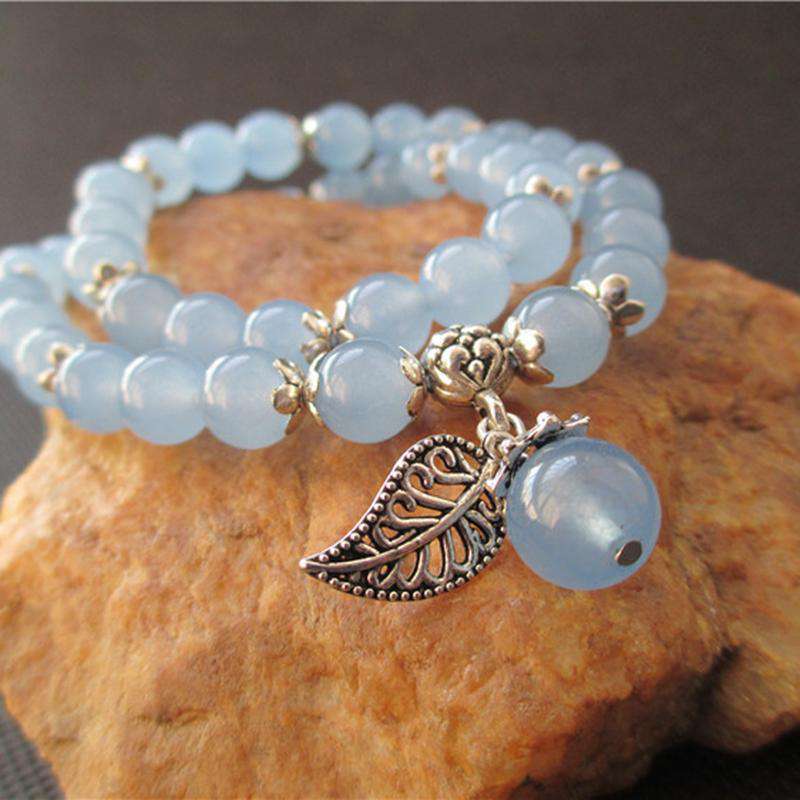 Bracelet Tibétain en perles de Jade bleu avec Pendentif en feuille d'Argent - L'univers-karma
